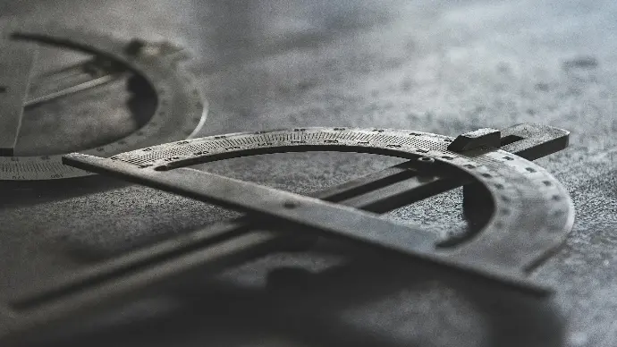grayscale photo of measuring equipment